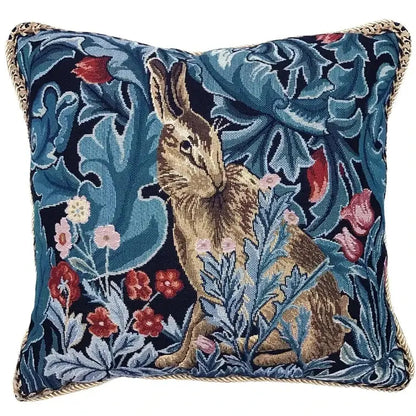 Vintage lion tapestry jacquard cushion cover in dark blue featuring a woven brown hare and colorful floral decorbites lion tapestry design