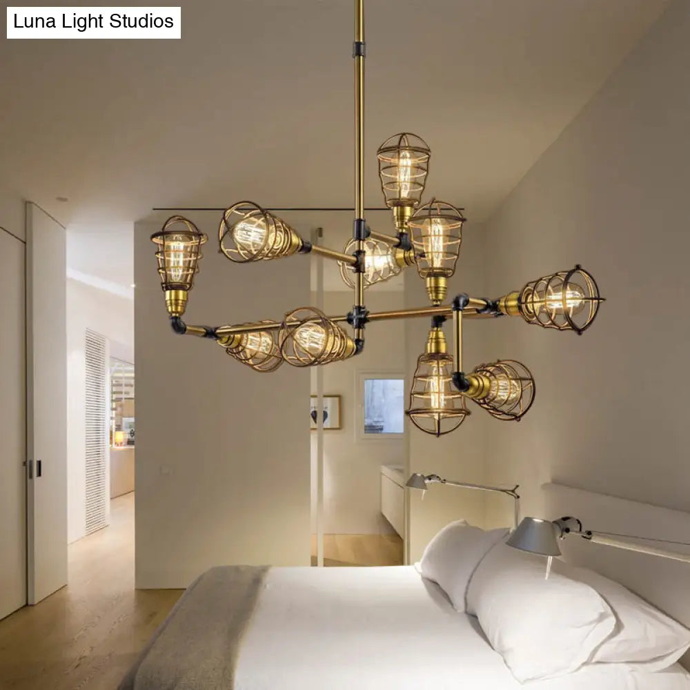 Lámpara colgante vintage de estilo loft, en latón cepillado, con diseño de araña enjaulada de múltiples luces.