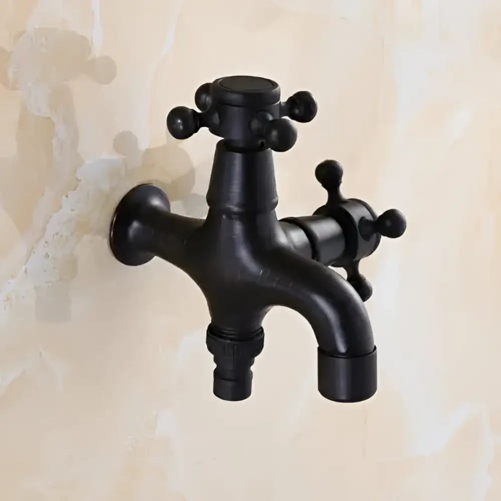 Vintage matte black dual handle wall-mounted washing machine faucet tap with a matte finish for laundry room use