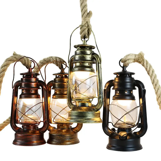 Three vintage mixed metal cage pendant lights with copper, brass, and black finishes for dining room decorative presence
