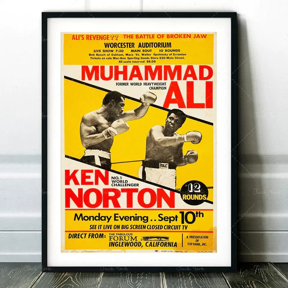 A framed vintage muhammad ali boxing photo print with black and white action and red text on yellow decorbites boxing decor