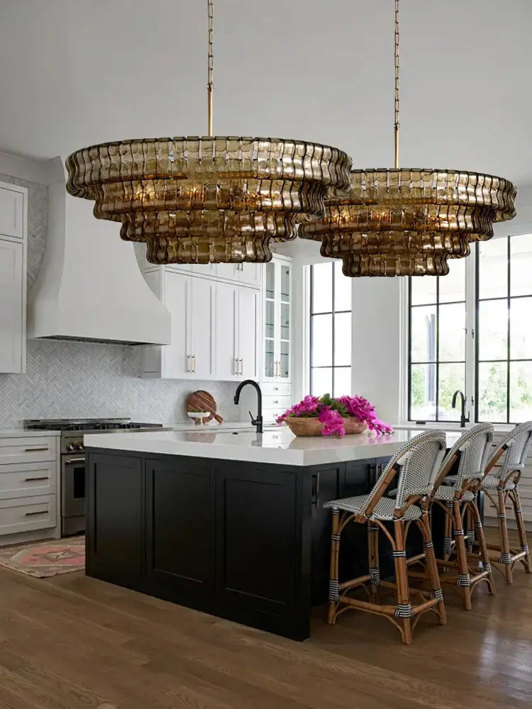 Vintage multi tier brown glass chandelier with textured glass design hanging above kitchen island decorbites brown glass
