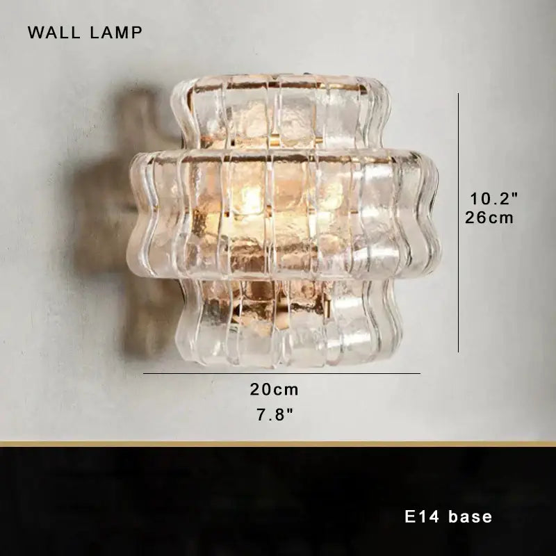 Clear ribbed glass wall lamp with stacked wave design and gold metal base for decorbites brown glass chandelier decor