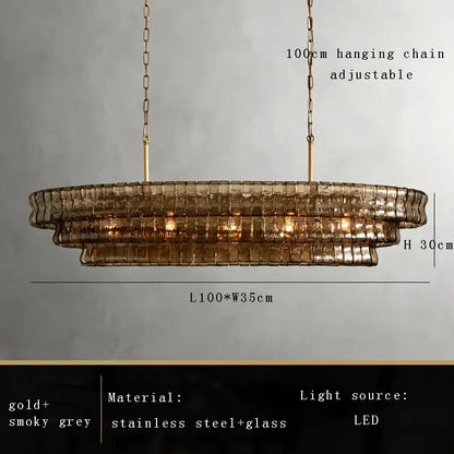 A modern decorbites brown glass chandelier with tiered gold and smoky grey stainless steel and glass for dining room decor