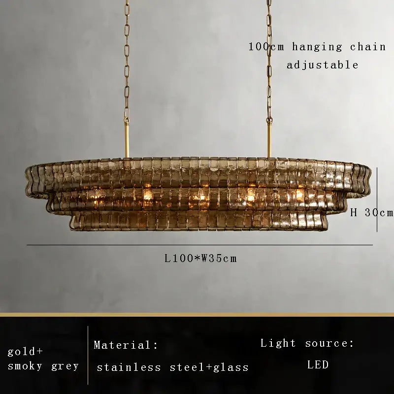 A modern decorbites brown glass chandelier with tiered gold and smoky grey stainless steel and glass for dining room decor