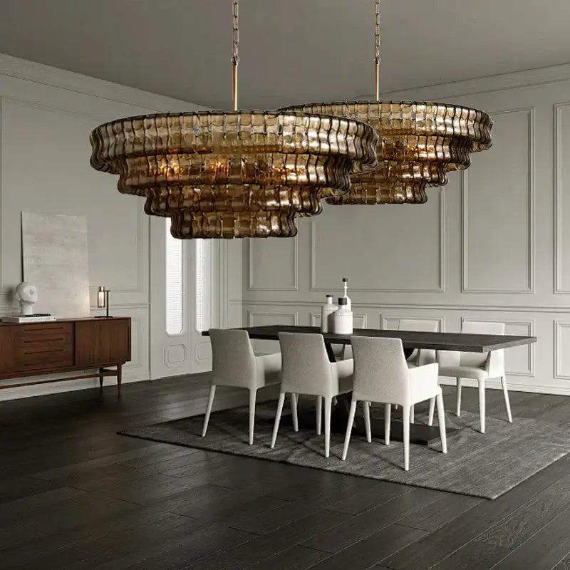 Vintage multi tier brown glass chandelier with a golden cascading design made of textured glass segments for dining room decorbites brown glass