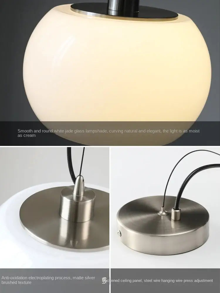 Cream-colored smooth white jade glass pendant lights with matte silver brushed metal base for vintage nordic restaurant use