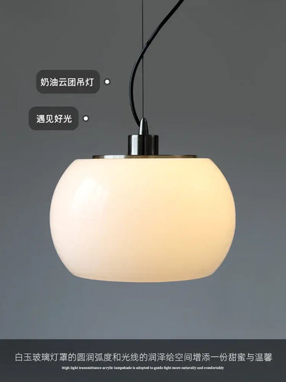 Vintage nordic cream ceramic pendant lights featuring a soft frosted white acrylic lamp with black cord for dining room