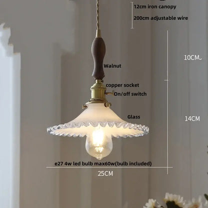 Vintage olive green glass led pendant lights with dark walnut iron canopy brass hardware and frosted scalloped shade