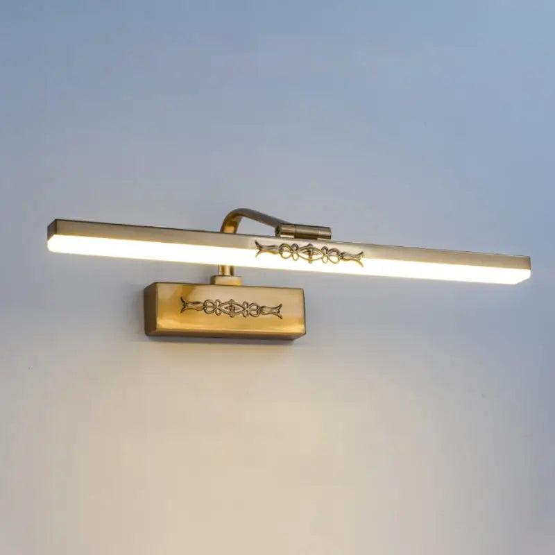 Gold-toned vintage ornate brass finish integrated led sconce light with decorative patterns for bedroom wall mounting