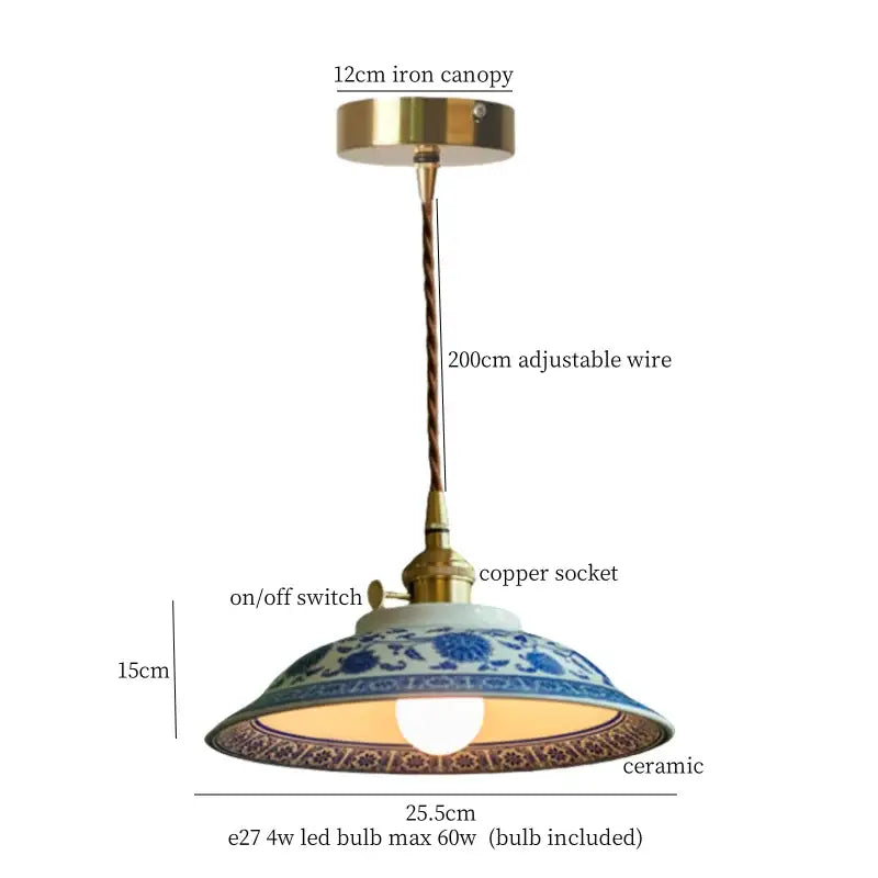 Vintage pale green glass pendant light with brass fixture and blue and white decorbites cyan ceramic led details
