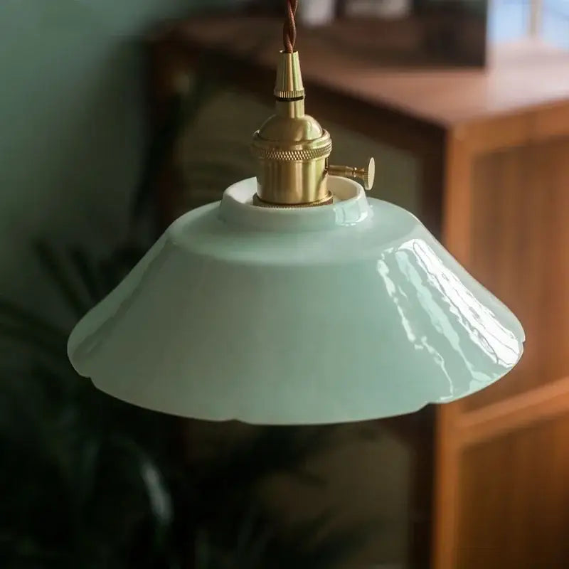 A delicate mint green ceramic pendant light with brass finish socket for kitchen hanging lamp by decorbites ceramic led