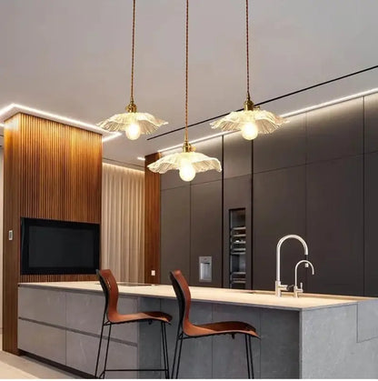 Three elegant vintage pendant lights with translucent petal glass shades and brass fixtures led bulb included