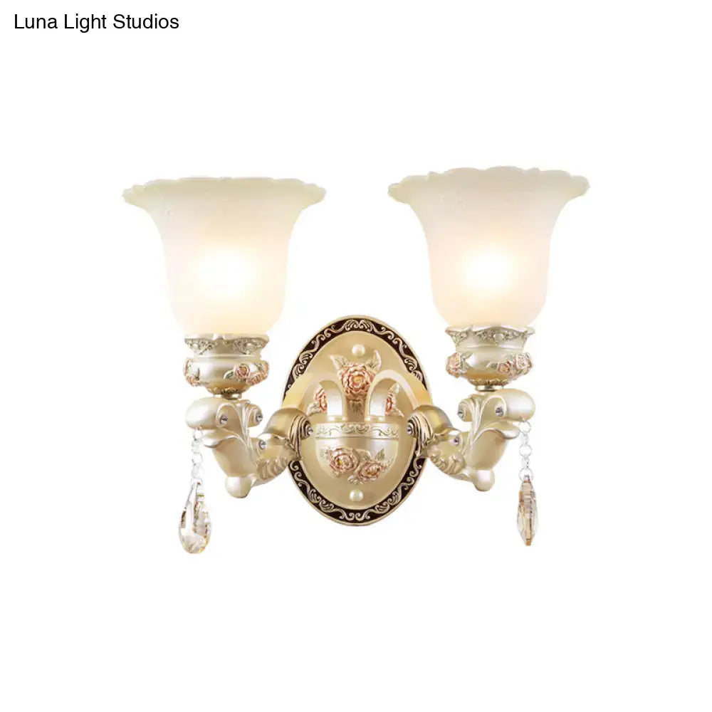 Antique gold-finished vintage petal glass wall sconce with ornate floral detailing and two frosted shades 110v-120v