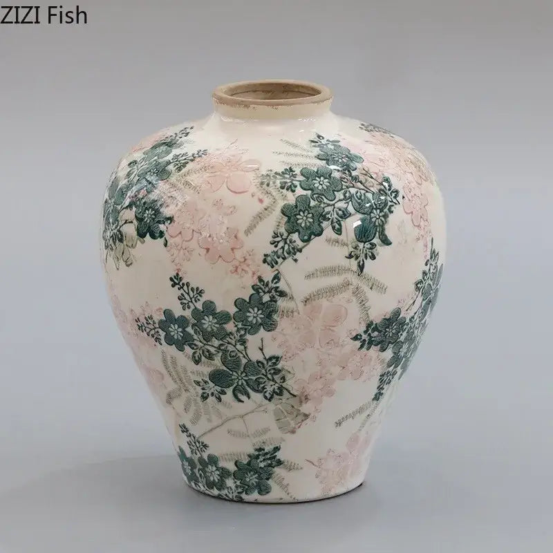 A cream-colored porcelain vase with pink floral patterns and decorbites cracked texture for vintage living room decor