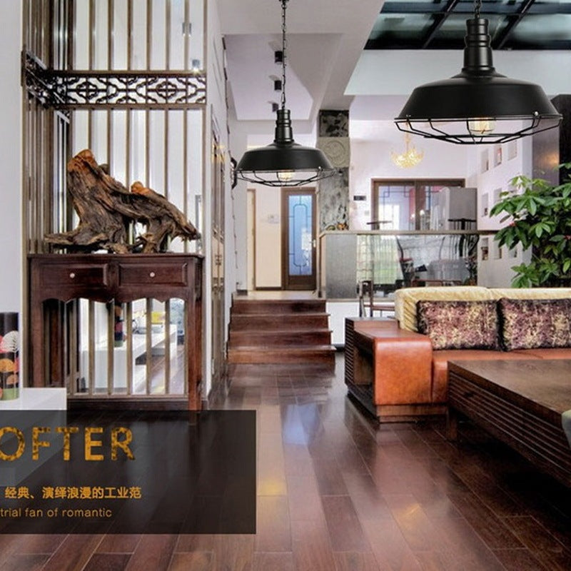 Dark brown wooden coffee table with intricate metal frame and natural wood grain texture.