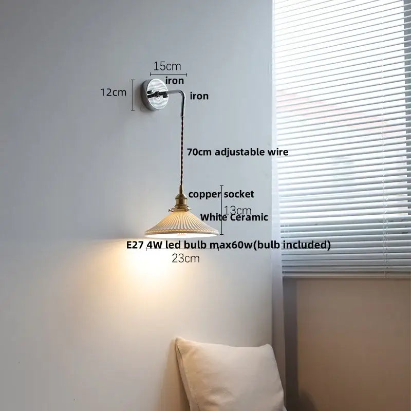 Vintage ribbed glass and brass wall sconce with a brass-finished copper socket, white ceramic shade, and adjustable iron arm decorbites ceramic led wall