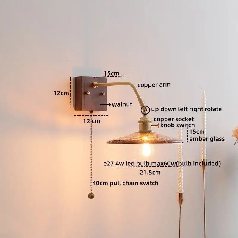 Vintage wall lamps featuring ceramic copper led with copper arm, walnut base, and amber ribbed glass shade by decorbites