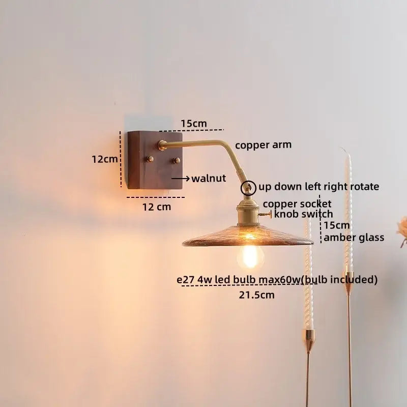 Warm-toned ceramic copper led wall lamp with walnut mounting plate and amber ribbed glass shade for bedroom decorbites