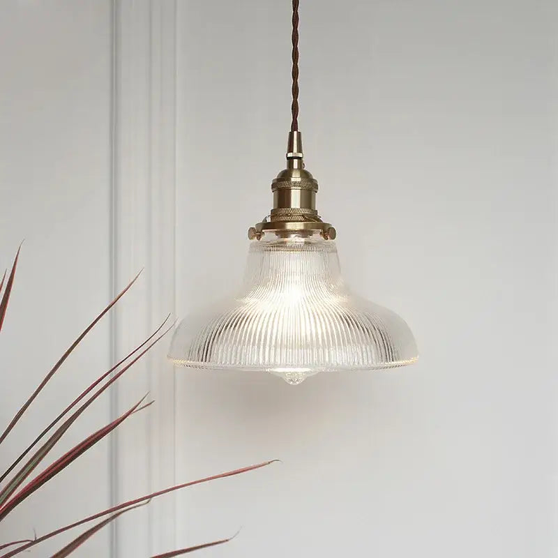 Vintage ribbed glass copper pendant light with brass hardware and twisted brown cord for kitchen dining room use