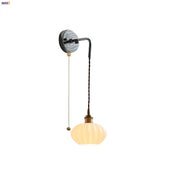 Vintage wall lamp with warm ribbed opal glass shade and brass decorbites ceramic canopy led for bedroom lighting