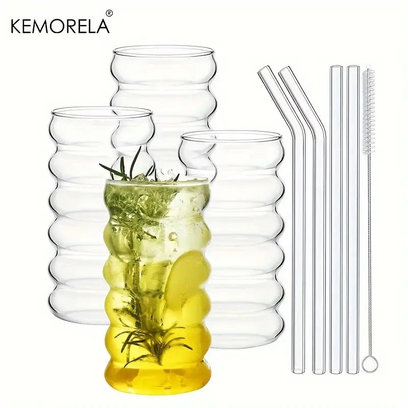 Clear ribbed glass tumblers featuring a vintage wave shape design ideal for modern wave shape beverage use