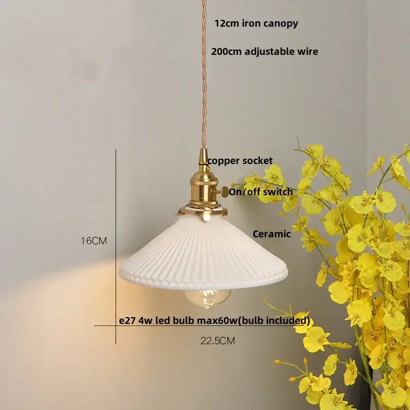 White ceramic pendant light fixture with fluted conical shade and brass accents for dining room with walnut wood details