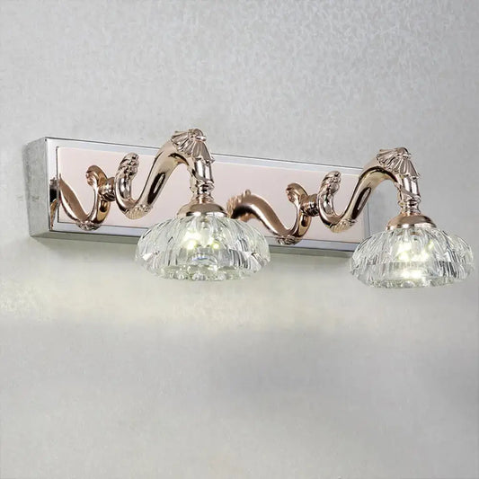 Silver-toned wall lamp with two ornate curved arms and faceted crystal glass shades for 110v-120v vintage vanity use