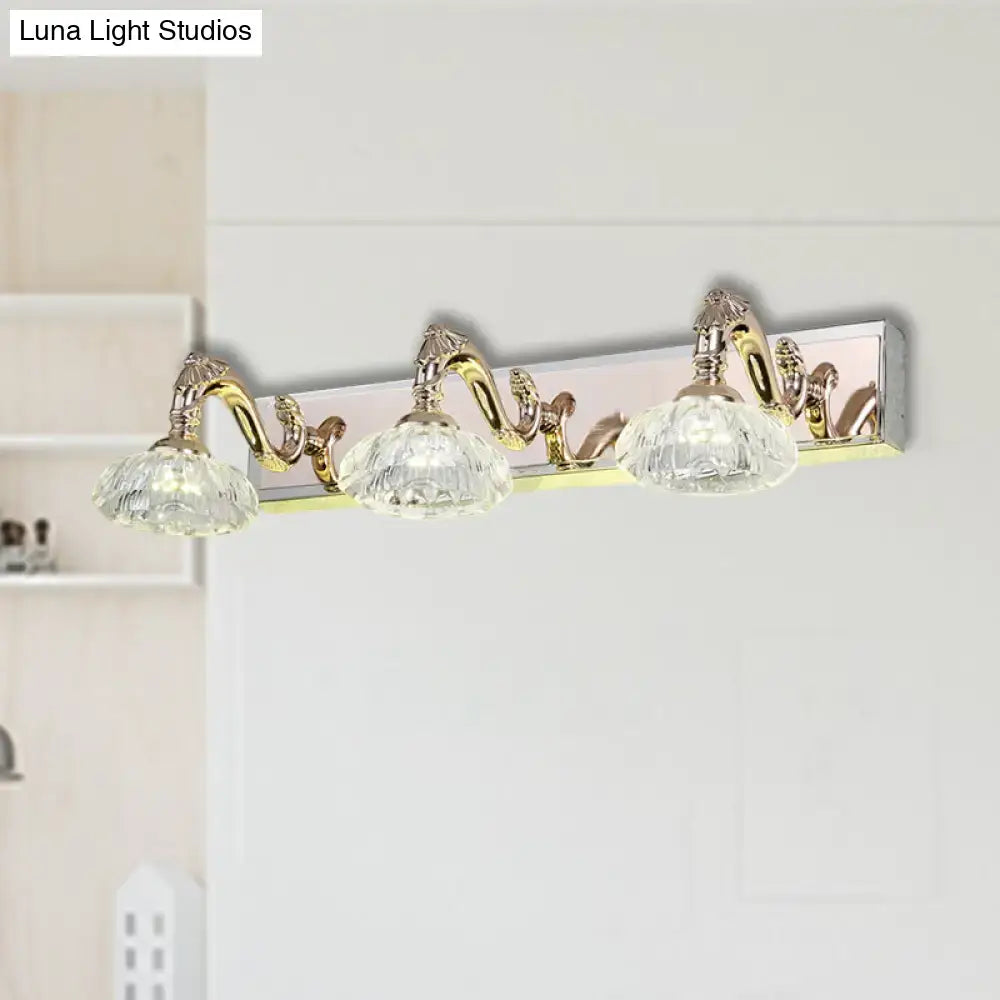 Elegant three-light gold finish wall lamp with faceted crystal shades on silver base for 110v-120v bathroom vanity use