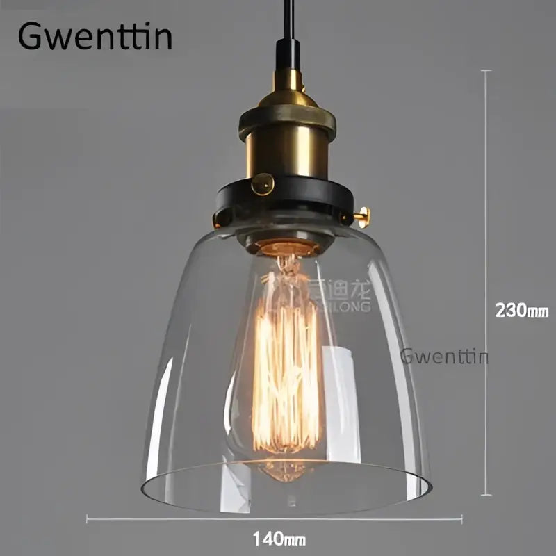 Clear glass bell-shaped pendant light with brass and black metal fixture featuring an exposed filament bulb for industrial glass pendant decorbites