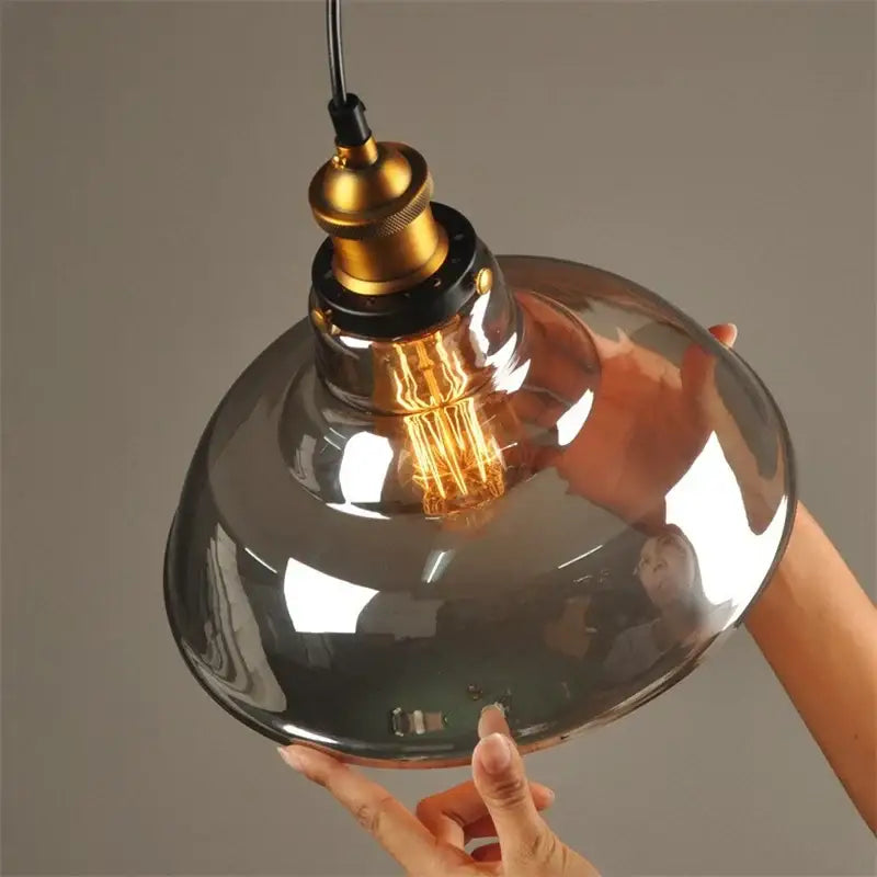A set of 4 vintage smoked glass ball pendant lights with brass accents and exposed filament bulbs for kitchen decorbites glass ball