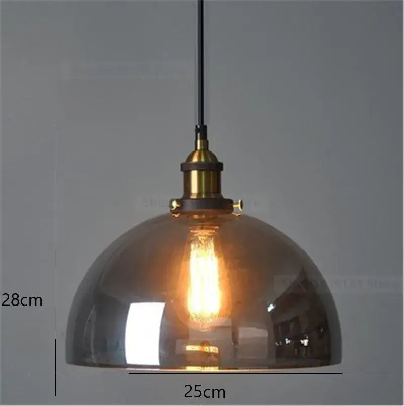 Vintage smoked glass ball pendant lights set of 4 featuring amber tinted glass ball with brass finish and edison bulbs