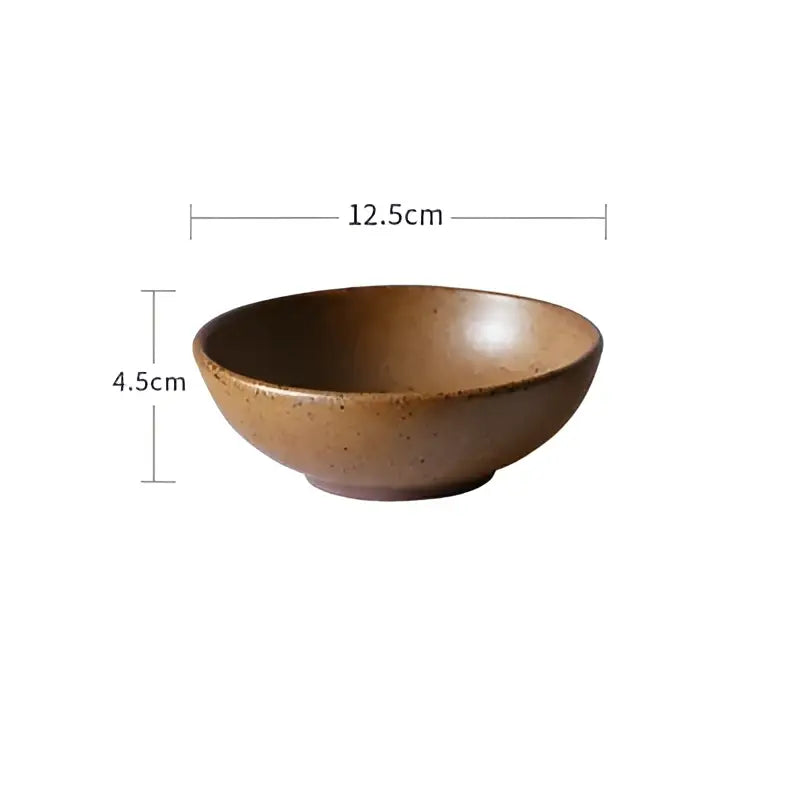 A rustic brown ceramic round swallow plate with speckled glaze and shallow design for decorbites ceramic round collection