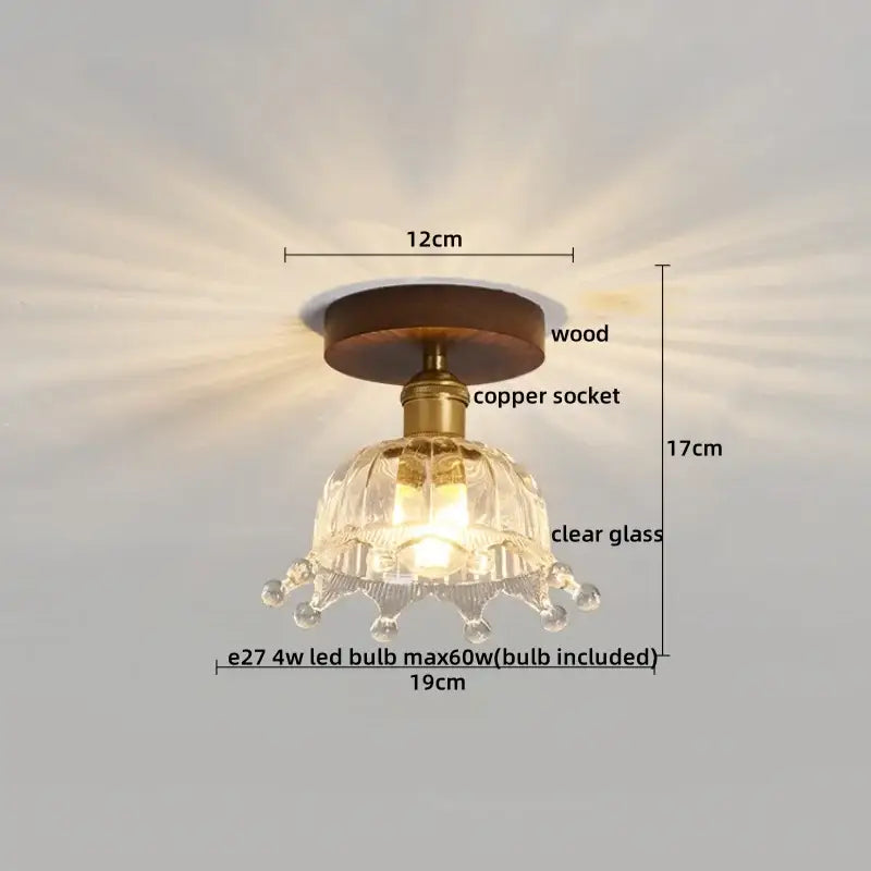 A vintage stained glass copper led ceiling lamp with a clear glass chandelier and wooden base for dining room
