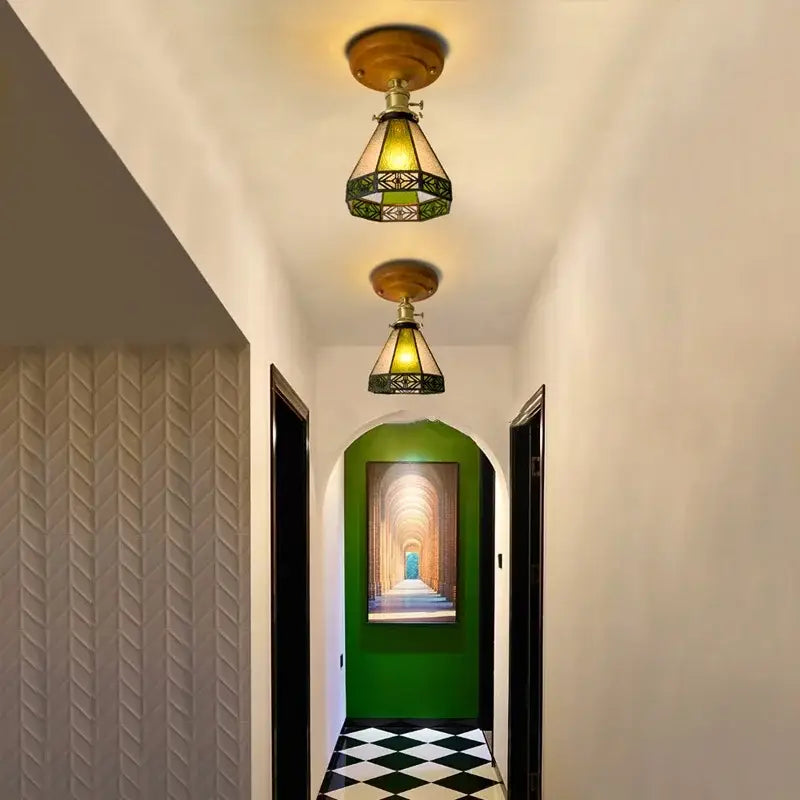 Vintage stained glass copper led ceiling lamp with brass-finished base and green geometric patterns for dining room
