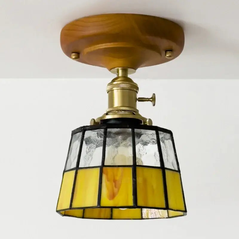 Vintage stained glass copper led ceiling lamp with a wooden base brass hardware and yellow clear panels for dining room