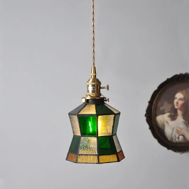 Vintage stained glass copper pendant light with green and gold geometric shade and wood knob switch for kitchen use