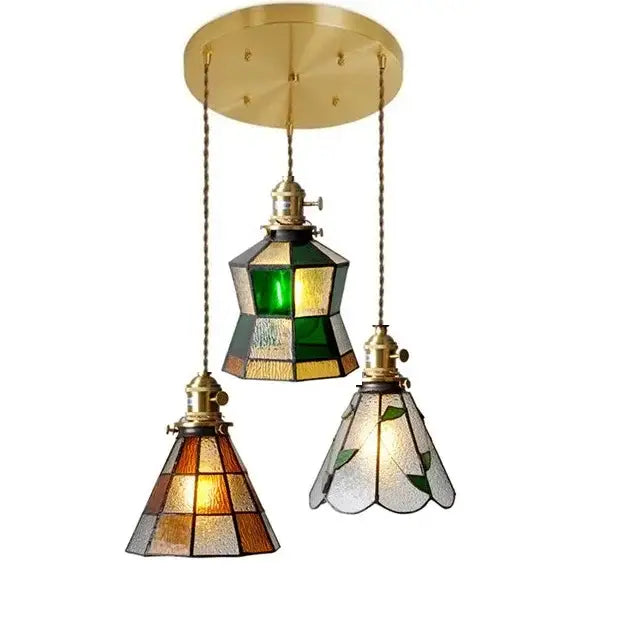 Three-piece brass glass copper pendant light with green amber frosted shades and wood knob switch for kitchen use