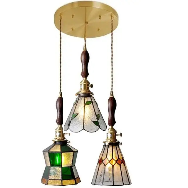 Three-piece vintage stained glass copper pendant light with green amber clear shades and wood knob switch for kitchen