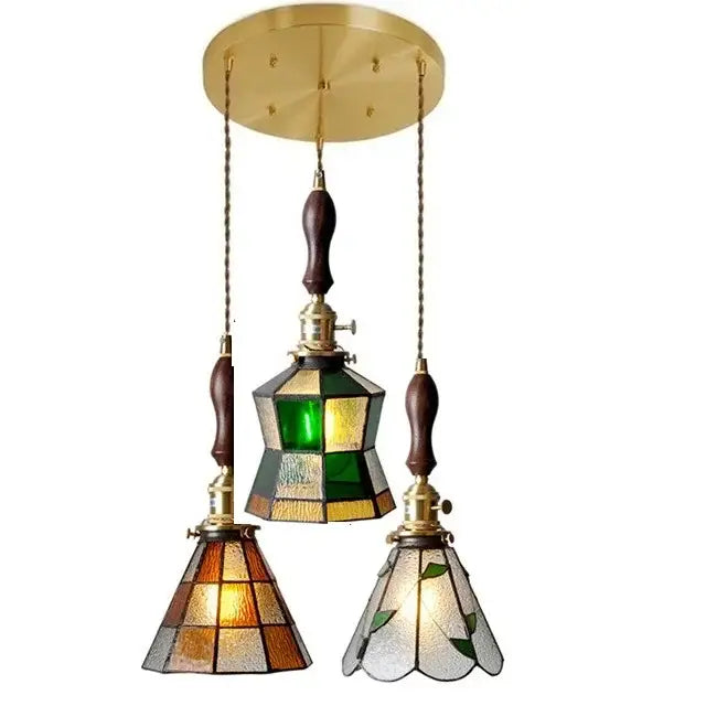 Vintage stained glass copper pendant light with three green amber and frosted shades and wood knob switch for kitchen