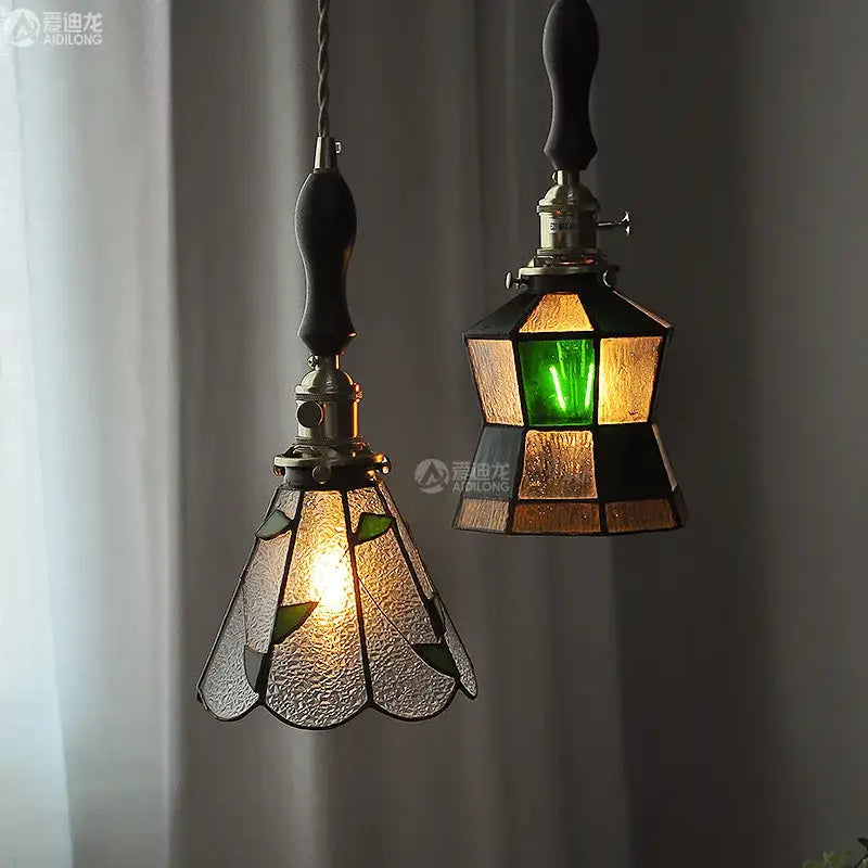 Vintage stained glass copper pendant lights with wood knob switch featuring green leaf and amber geometric shades