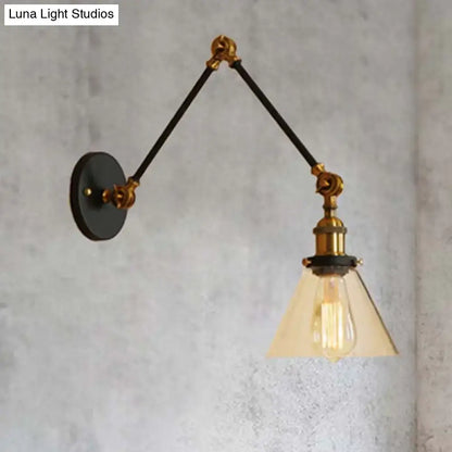 DecorBites vintage style wall sconce with black articulated arms, satin brass fittings, and clear glass shade