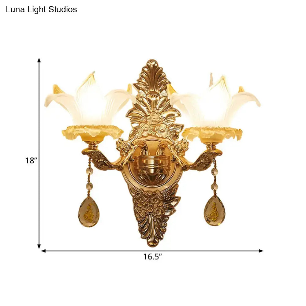 Vintage style gold wall light with opal glass lily shades and crystal pendants for bedroom lighting
