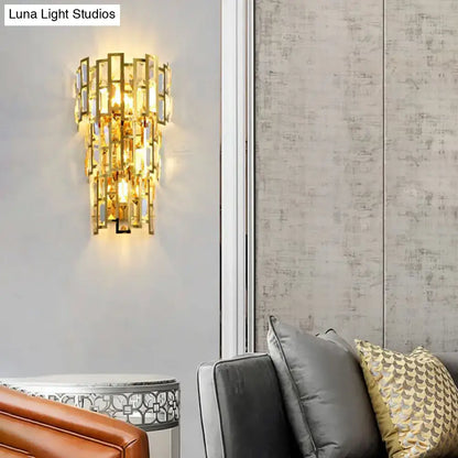 Gold-toned crystal vintage style tiered wall sconce with geometric design for living room lighting