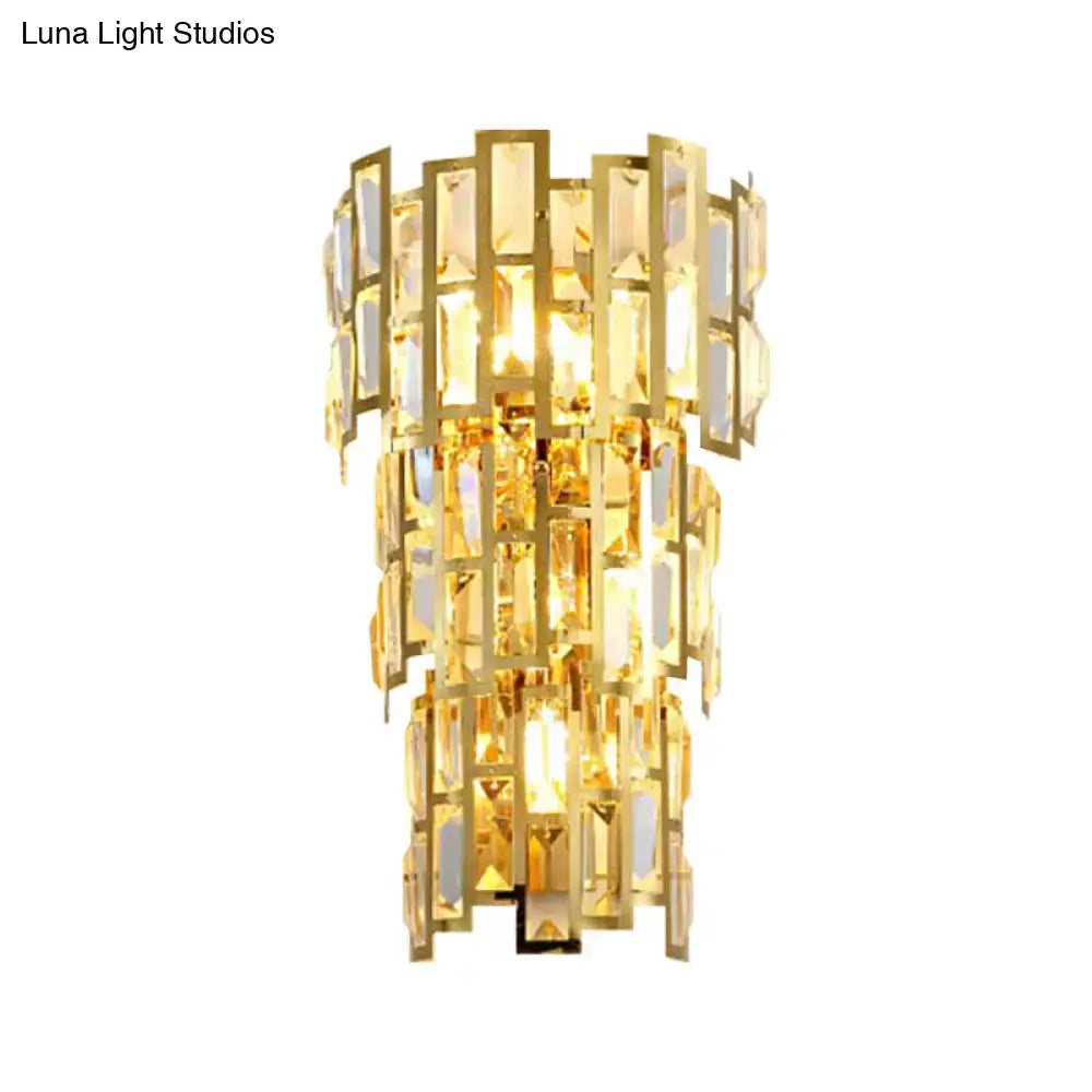 Vintage style gold tiered wall sconce with cascading rectangular crystal panels for living room lighting
