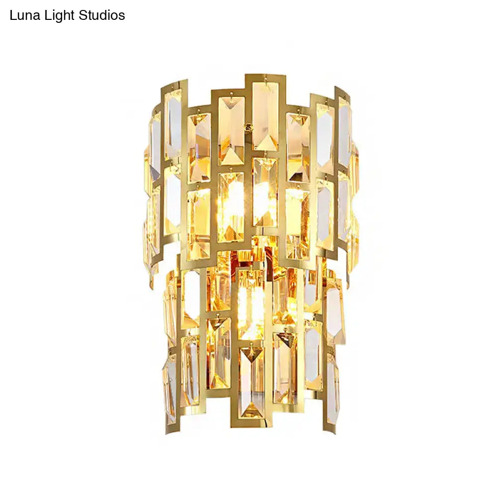 Vintage style gold tiered wall sconce with cascading rectangular crystal panels for living room lighting