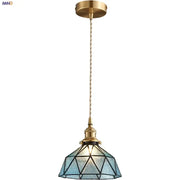 Vintage teal blue glass led pendant light with brass metal frame and faceted shade by decorbites blue glass