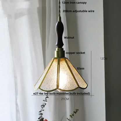 A warm-toned textured glass pendant light with walnut iron canopy and copper socket for decorbites blue glass led fixture