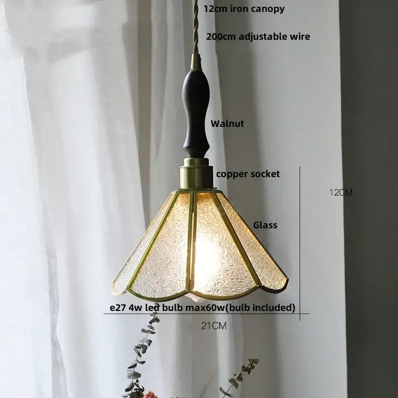 A warm-toned textured glass pendant light with walnut iron canopy and copper socket for decorbites blue glass led fixture