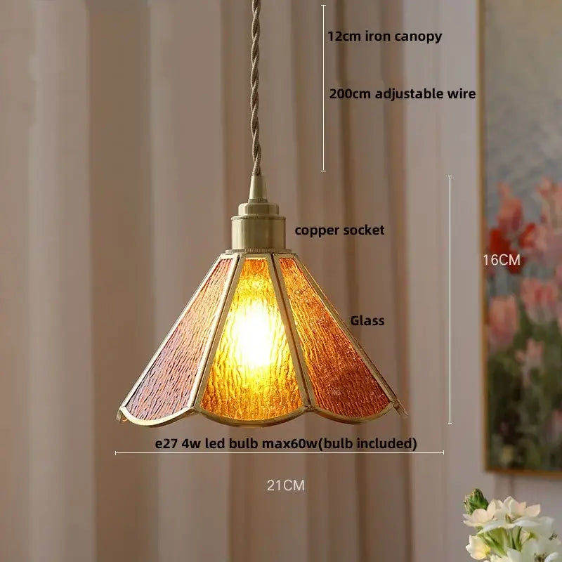 A warm amber-toned stained glass pendant light with copper socket and iron canopy for decorbites blue glass led fixture